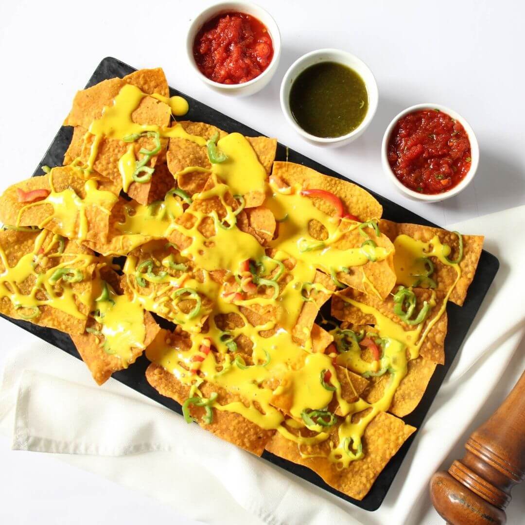 Homemade nachos with a creamy cheese sauce